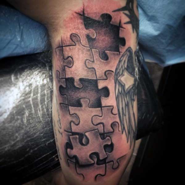 Puzzleteilen tattoo 93