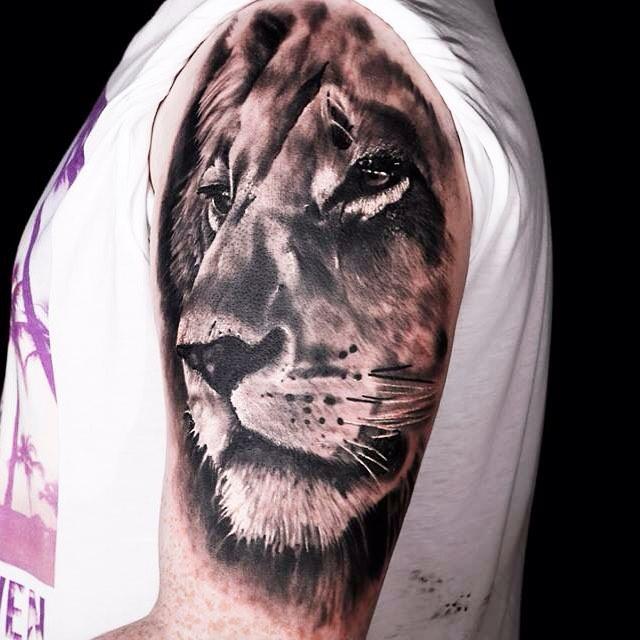 lion tattoo 77