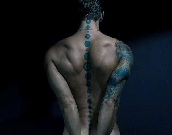 tatuaje columna vertebral 187