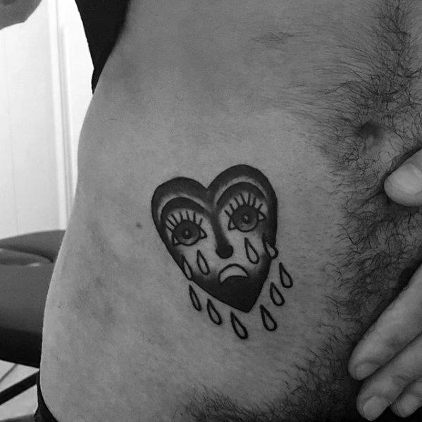 tatuaje corazon llorando 06