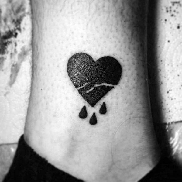 tatuaje corazon roto partido 20