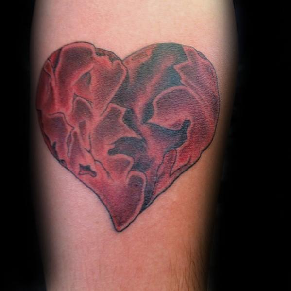 tatuaje corazon roto partido 30