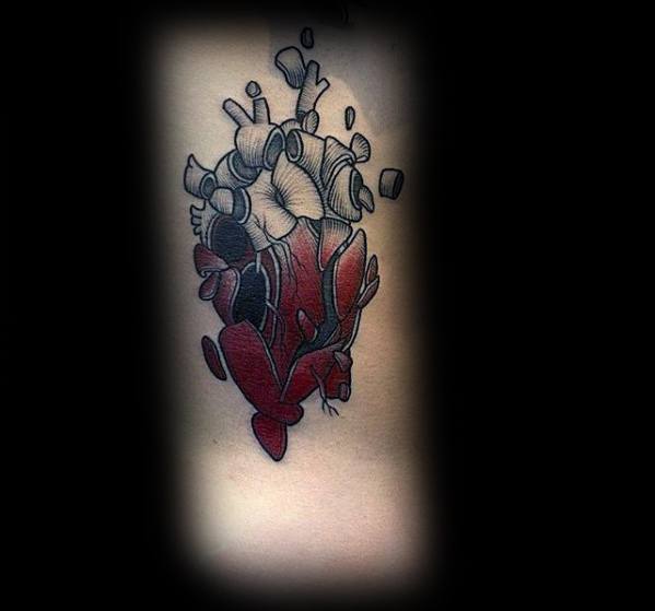 tatuaje corazon roto partido 46