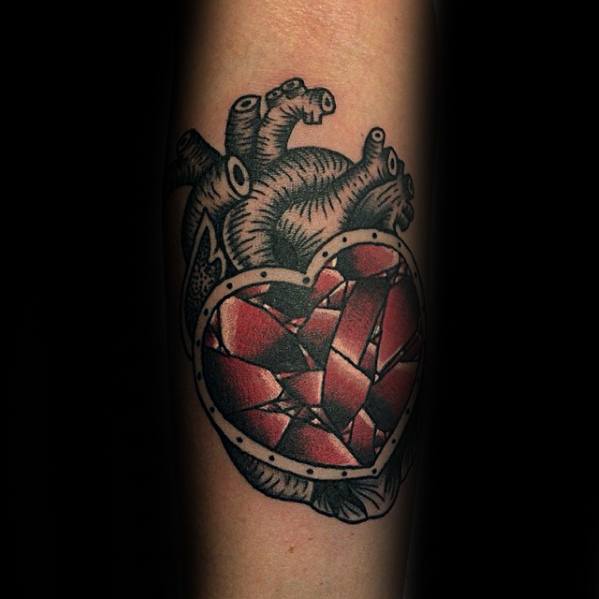 tatuaje corazon roto partido 70