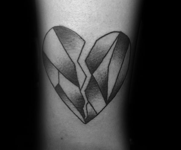 tatuaje corazon roto partido 74