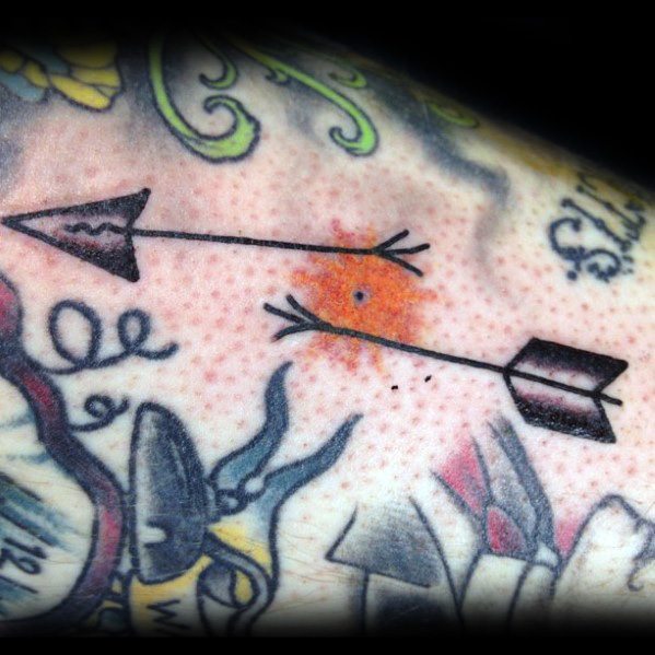 tatuaje flecha rota 25
