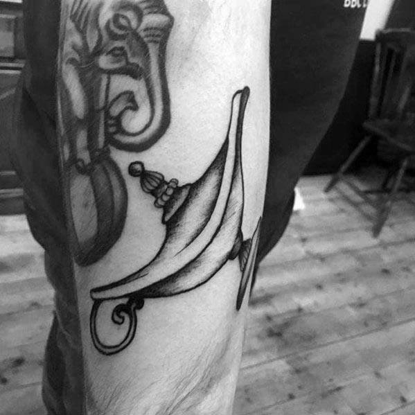 tatuaje lampara genio aladdin 37