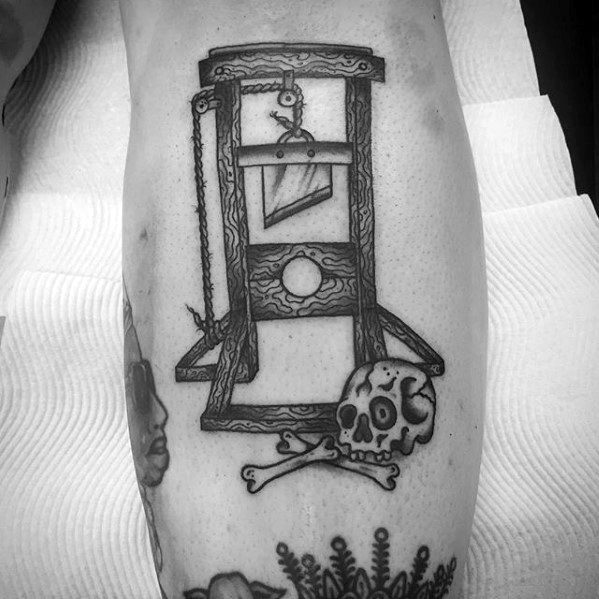 tatuaje guillotina 89