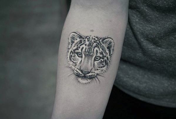 tatuaje leopardo nieves 43