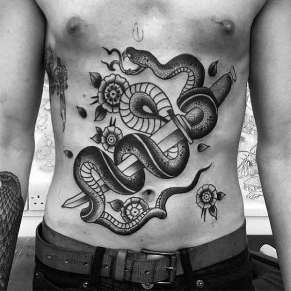 tatuaje serpiente y daga 79
