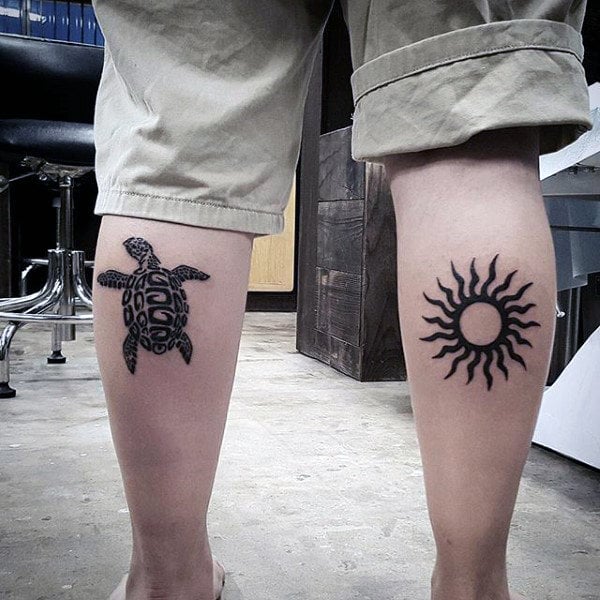 tatuaje sol tribal 69