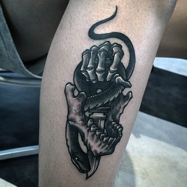 tatouage serpent et dague 37