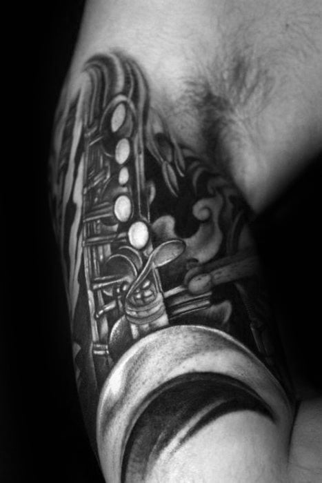 tatouage saxophone 85