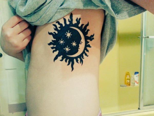 tatouage soleil 80