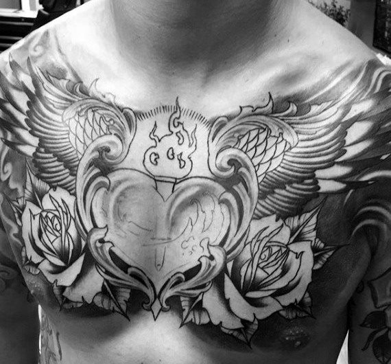 tatouage ailes sur la poitrine 69