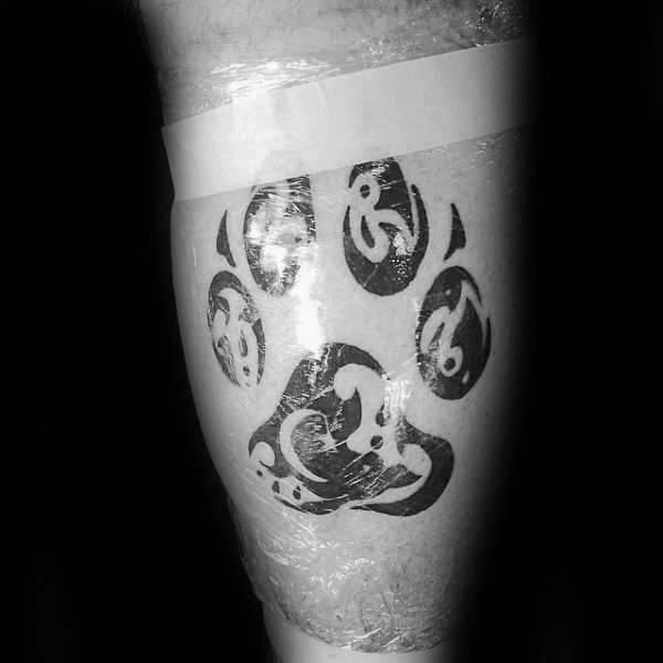 tatouage griffe empreintes loup 31
