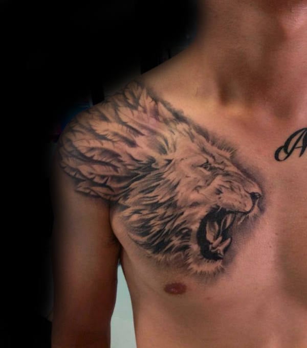 tatouage lion poitrine 49