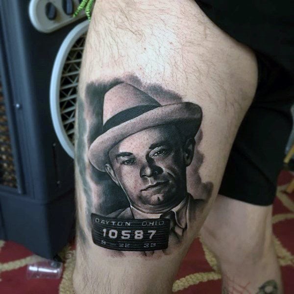 Tatouage de gangster : Significations, dessins et motifs les plus tatoués