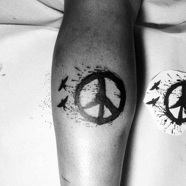 tatouage symbole paix 69
