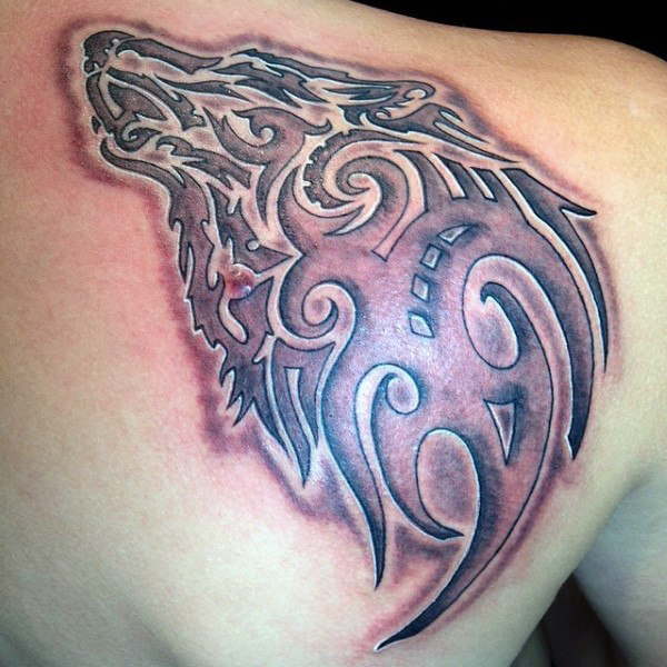 tatouage loup tribal 83