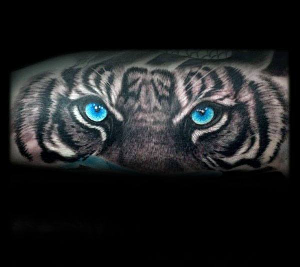 tatouage yeux de tigre 73