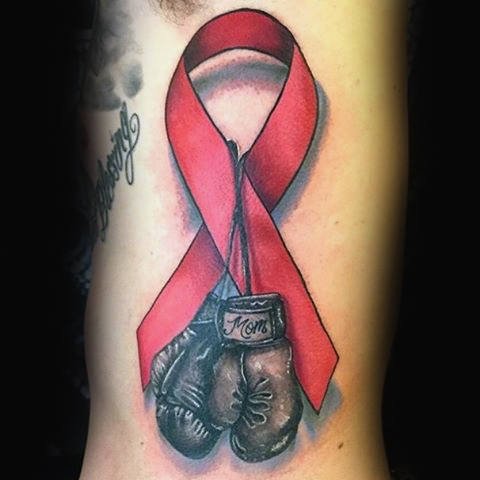 tatuaggio nastro contro cancro 21