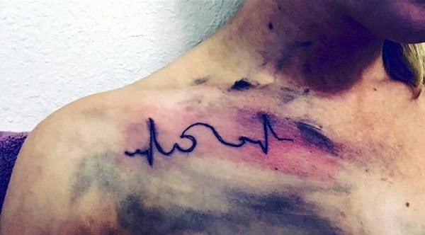 tatuaggio elettrocardiogramma frequenza cardiaca 157