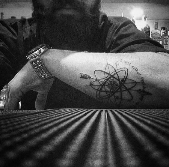 tatuaggio atomo 117