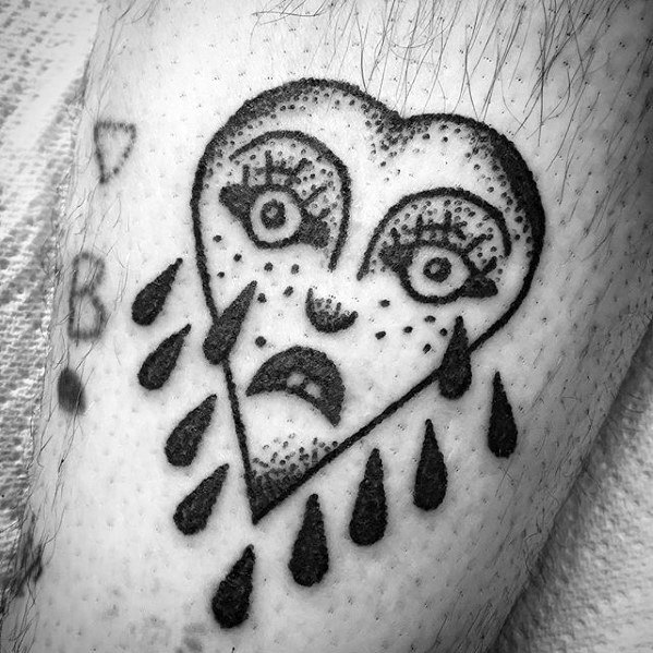 tatuaggio cuore che piange 55