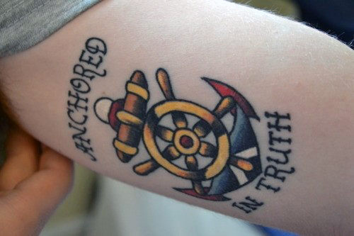 tatuaggio timone volante barca 51