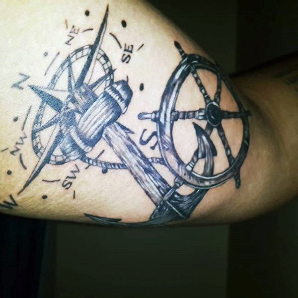 tatuaggio timone volante barca 75