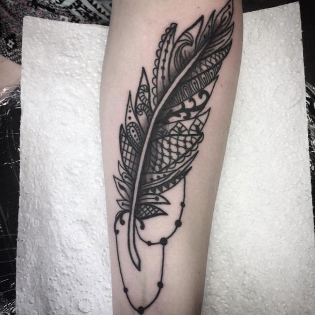 onderarm tattoo 220