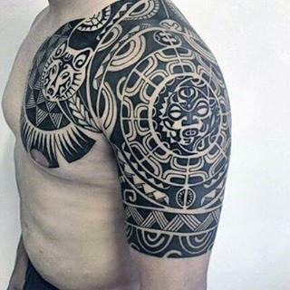 tatuaz tribal na ramieniu 144
