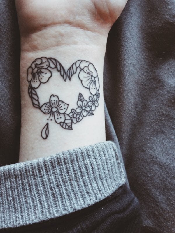 120 tatuagens de corações (desenhos e os seus significados)