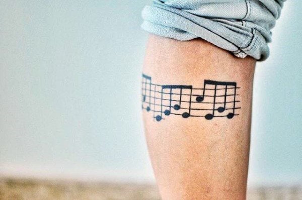 75 tatuagens de notas musicais (com o significado)