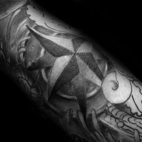 tatuagem estrela nautica 66