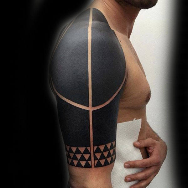 tatuagem braco tribal 69